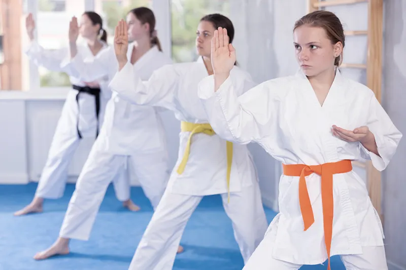Children captured while completing martial arts-style moves