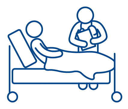 person lying in bed talking to a doctor